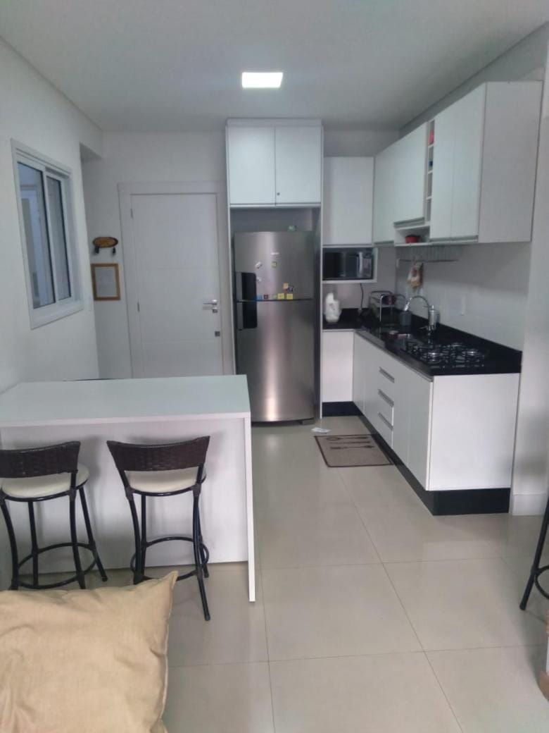 Apto na praia de Palmas, climatizado, com piscina, próximo ao mar e com jardim privativo Apartment in Florianopolis