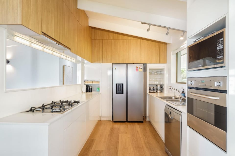 Kitchen or kitchenette, dishwasher, oven, stove, toaster