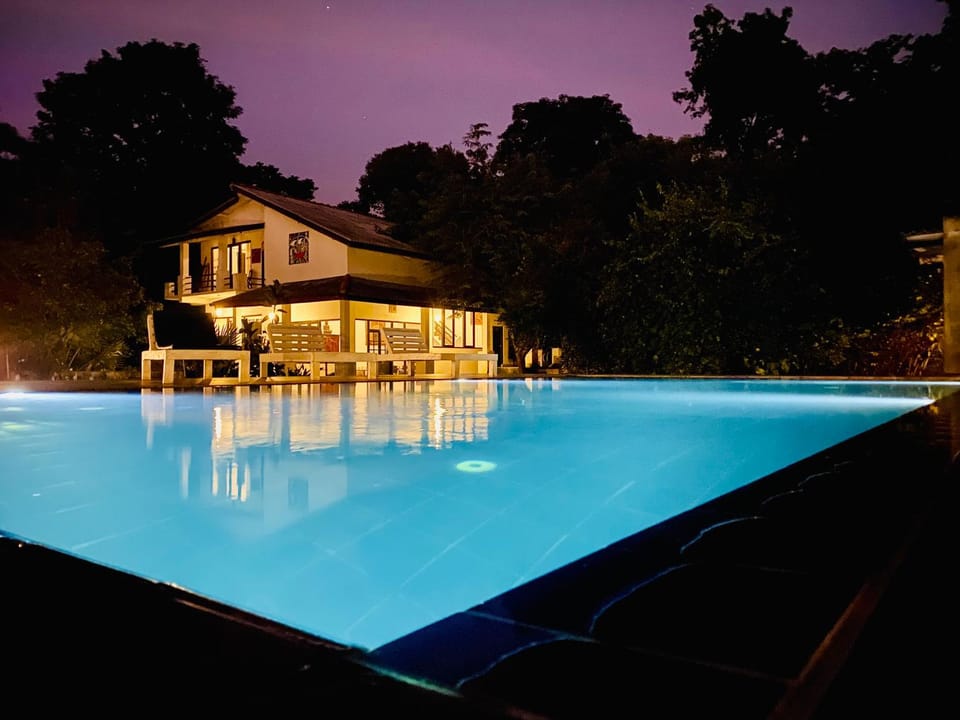 Property building, Night, Pool view, Swimming pool