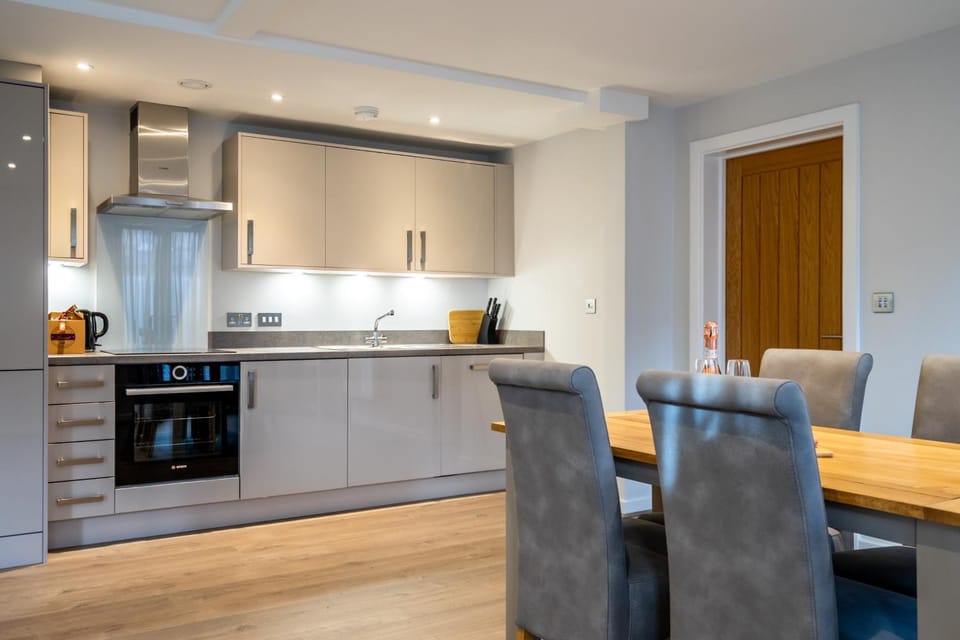 Kitchen or kitchenette, Seating area, Dining area, oven, stove, kitchen