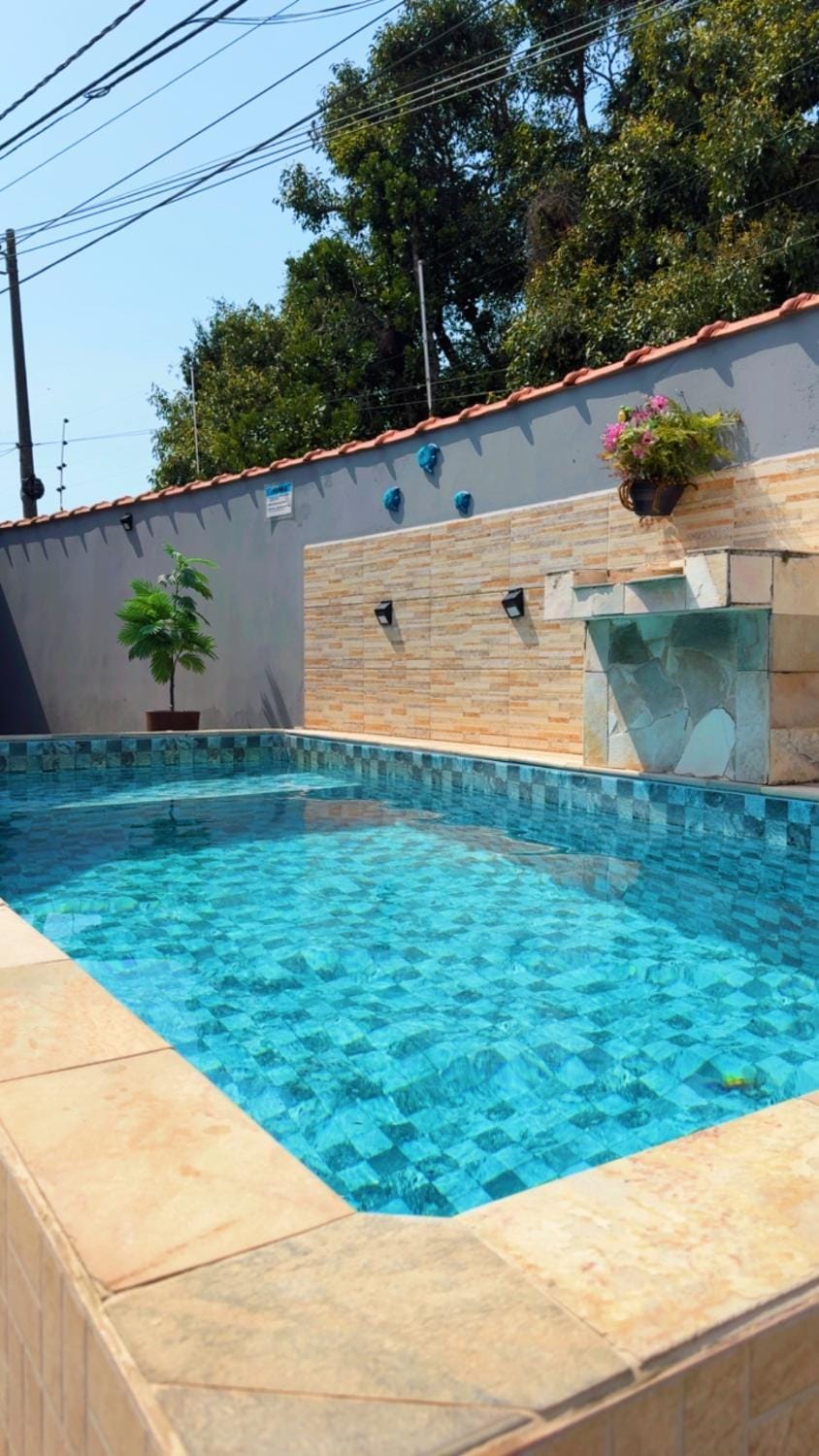 Casa com piscina climatizada em Itanhaém! House in Itanhaém