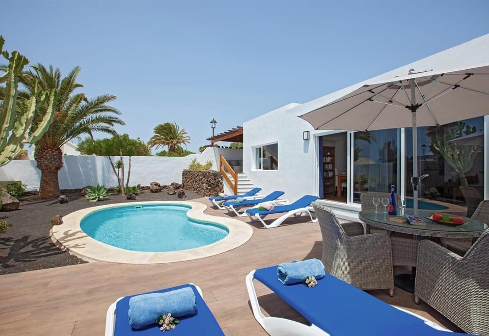 Property building, Living room, Swimming pool