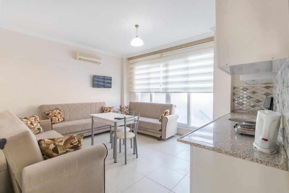 Kitchen or kitchenette, Living room, Seating area, Dining area