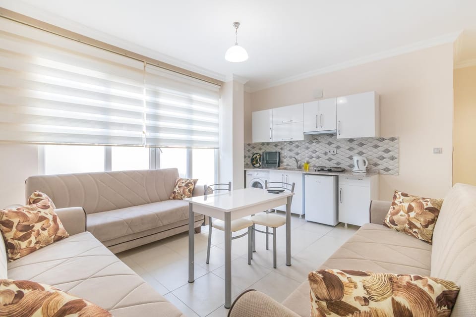 Kitchen or kitchenette, Living room, Seating area, Dining area