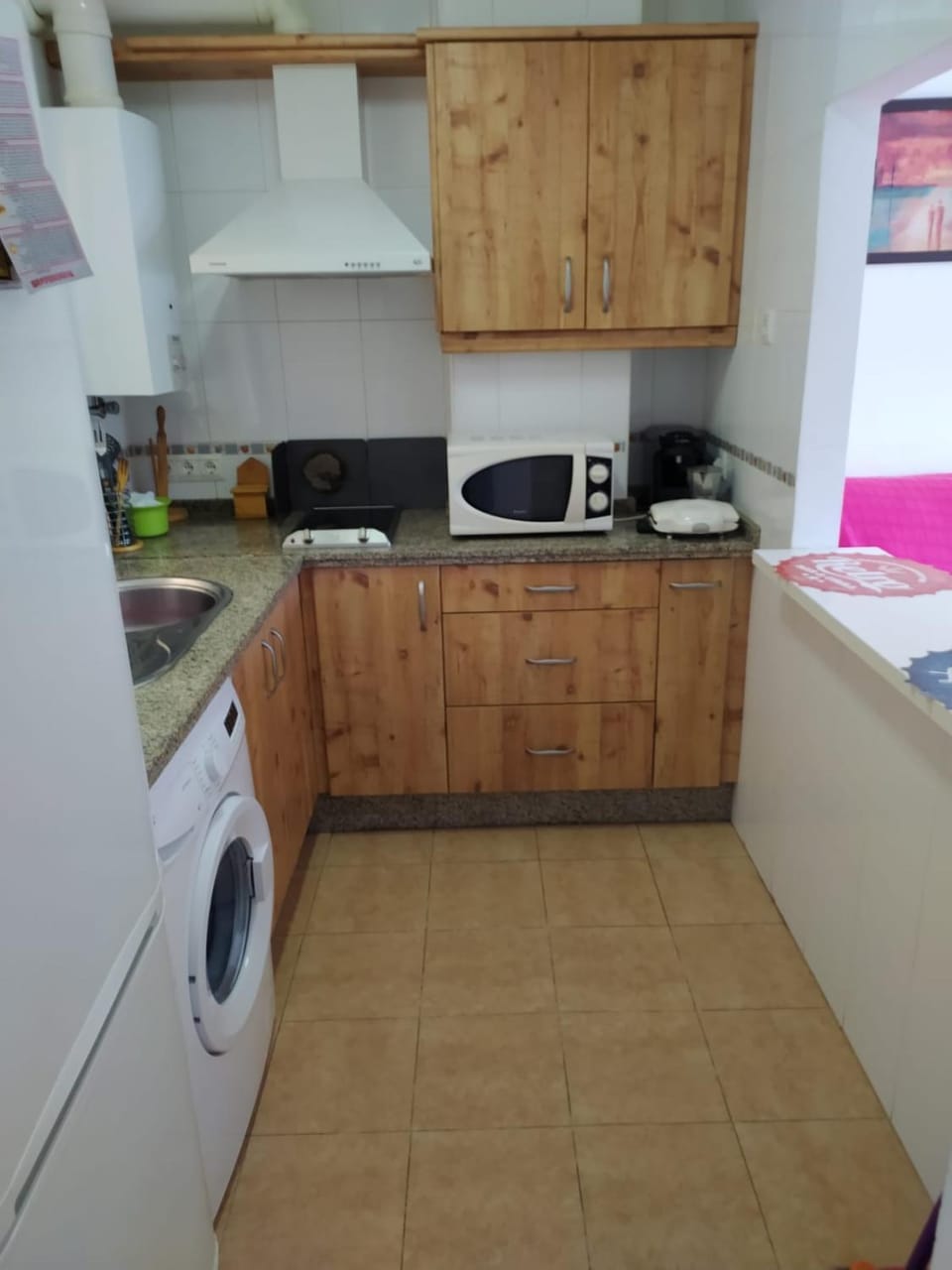 Kitchen or kitchenette, minibar, stove, toaster, washing machine