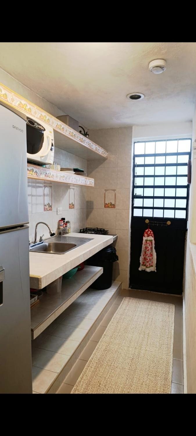 Kitchen or kitchenette, microwave, toaster