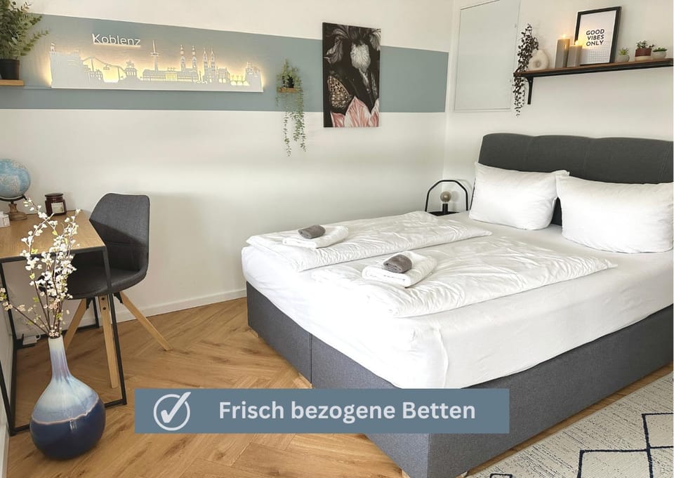 Wonderful World Apartment - stadtnah, Balkon, Parkplatz, E-Ladestation, Fitnessstudio Apartment in Koblenz