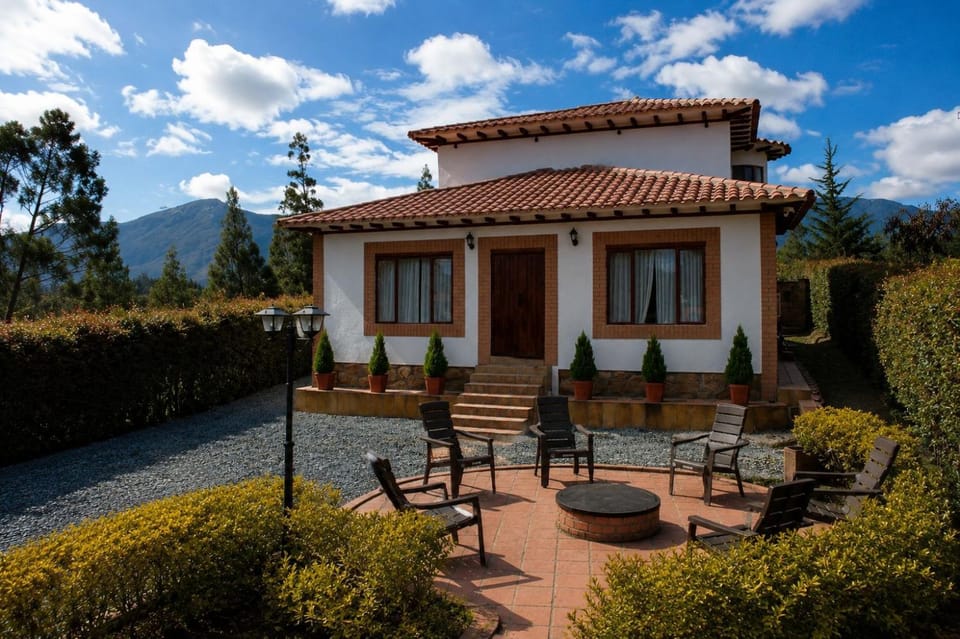 Property building, Patio, Day, Natural landscape, Garden, View (from property/room), Garden view, Mountain view