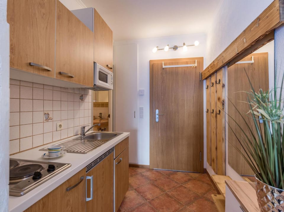 Kitchen or kitchenette, stove