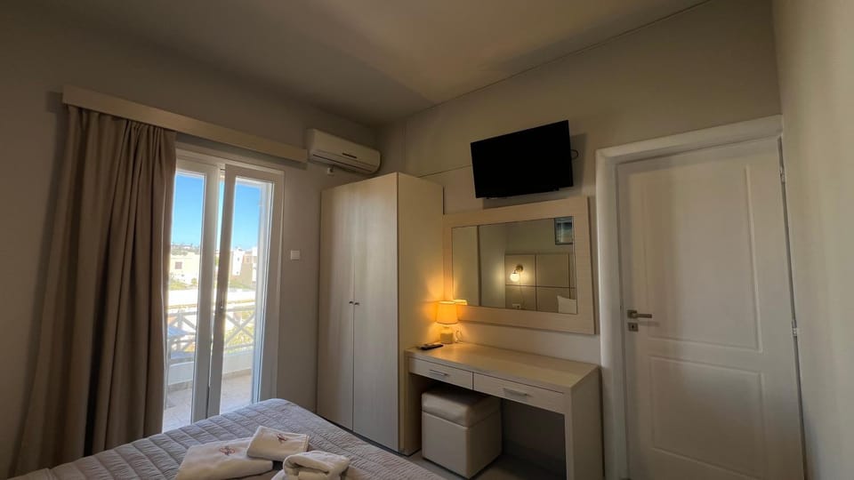 Bed, Balcony/Terrace, Bedroom, towels, wardrobe, air conditioner
