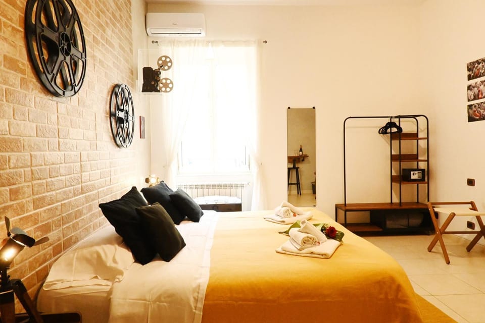 Bed, Photo of the whole room, Decorative detail, safe, towels, air conditioner