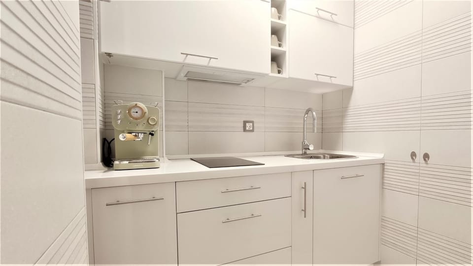 Kitchen or kitchenette, stove