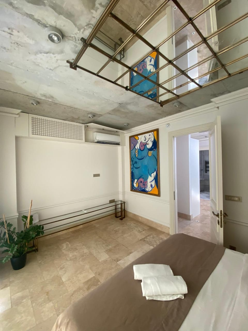 Bed, Decorative detail, Bedroom, towels, air conditioner