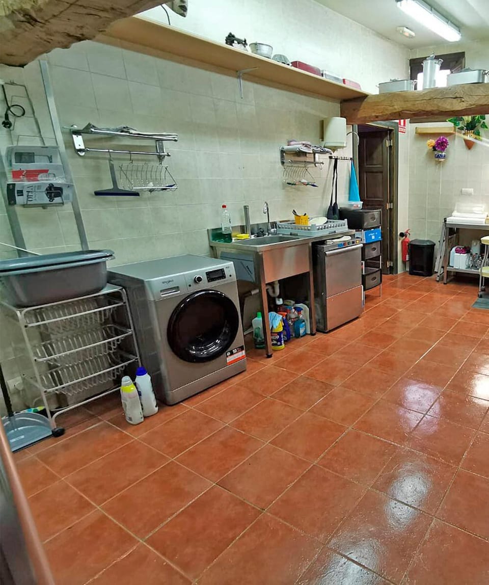 Kitchen or kitchenette, washing machine