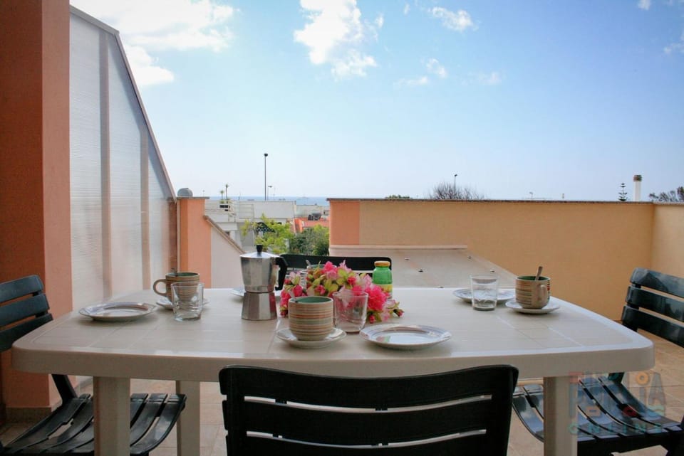 Property building, Patio, Day, View (from property/room), Balcony/Terrace, Living room, Seating area, Dining area