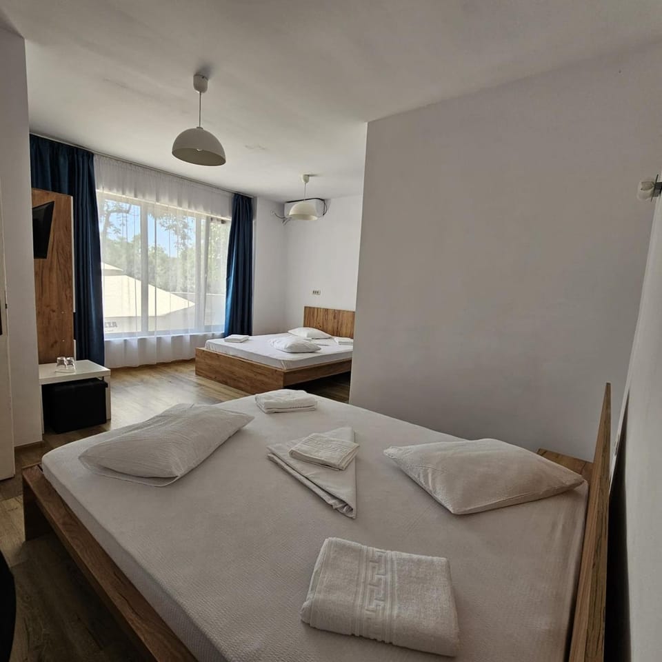 Bed, Photo of the whole room, Bedroom, towels, air conditioner