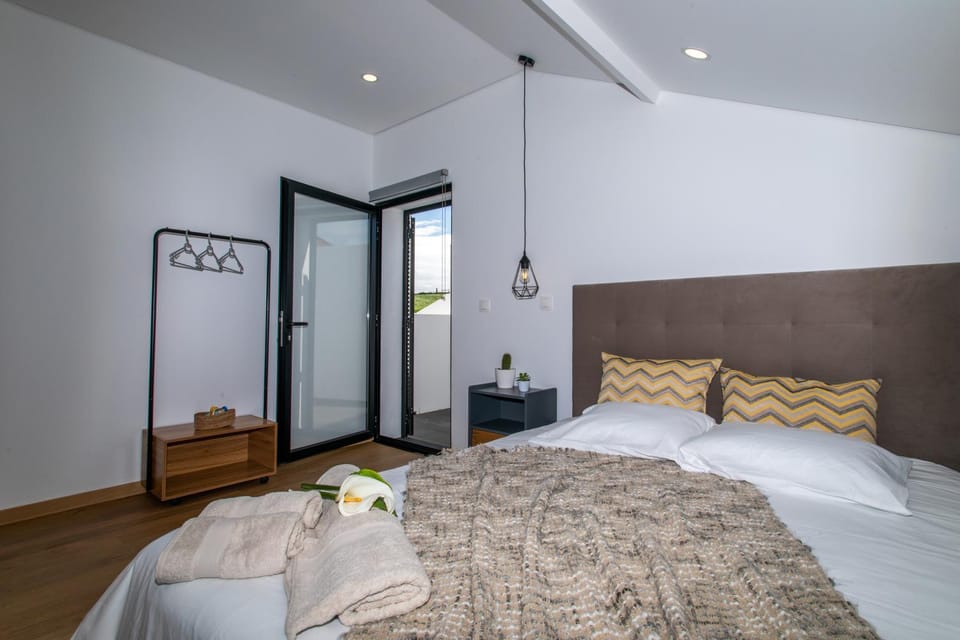 Bed, Photo of the whole room, Bedroom, towels, wardrobe