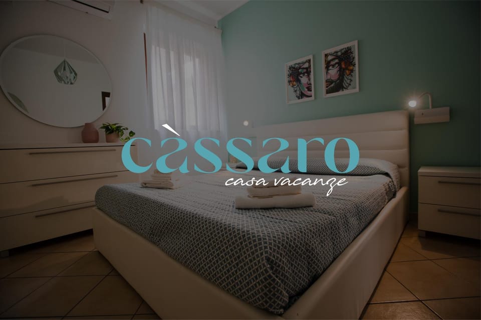 Bed, Property logo or sign, Bedroom