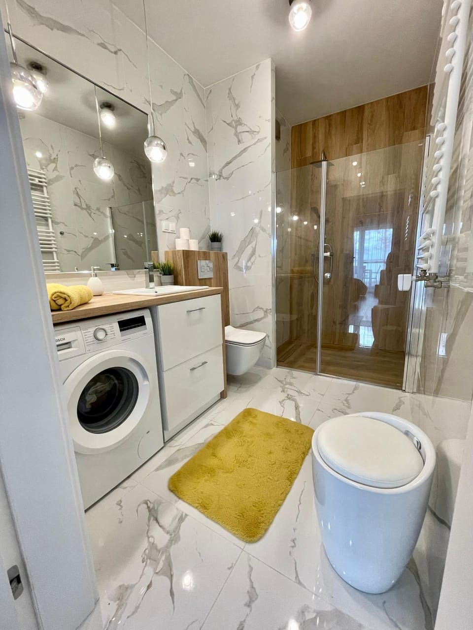 Shower, Toilet, Bathroom, towels, washing machine, dryer