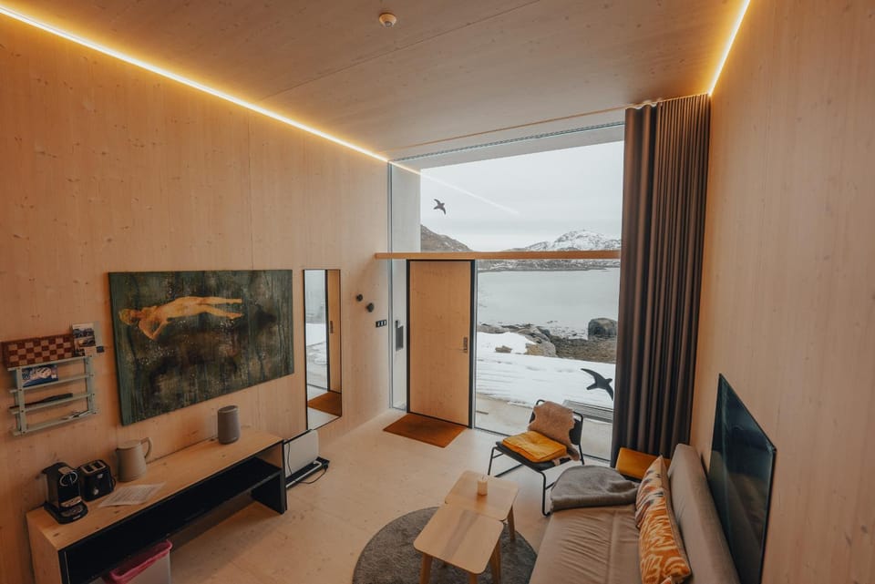 View (from property/room), Living room, Photo of the whole room, Seating area, Mountain view, Sea view