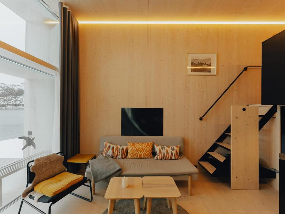 View (from property/room), Living room, Seating area, Mountain view, Sea view