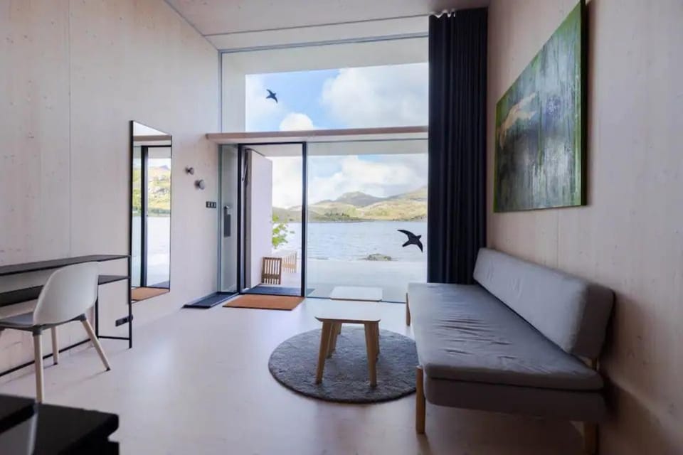 View (from property/room), Living room, Seating area, Mountain view, Sea view