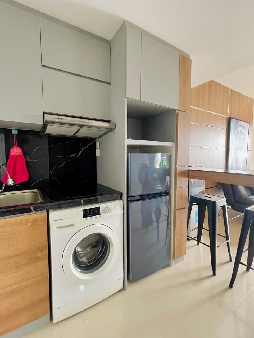 Kitchen or kitchenette, dishwasher, minibar, stove, washing machine, dryer