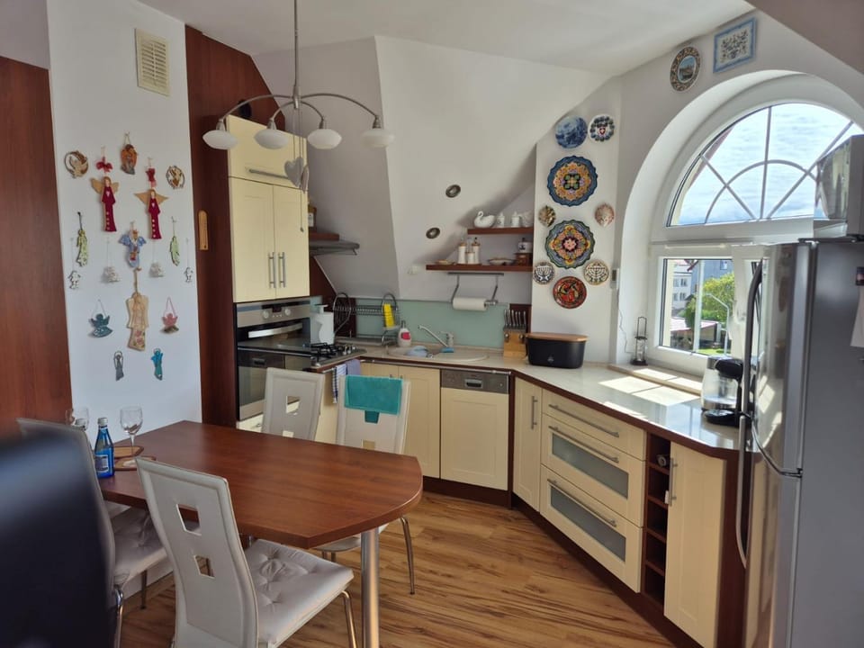 Kitchen or kitchenette, dishwasher, oven, stove, toaster