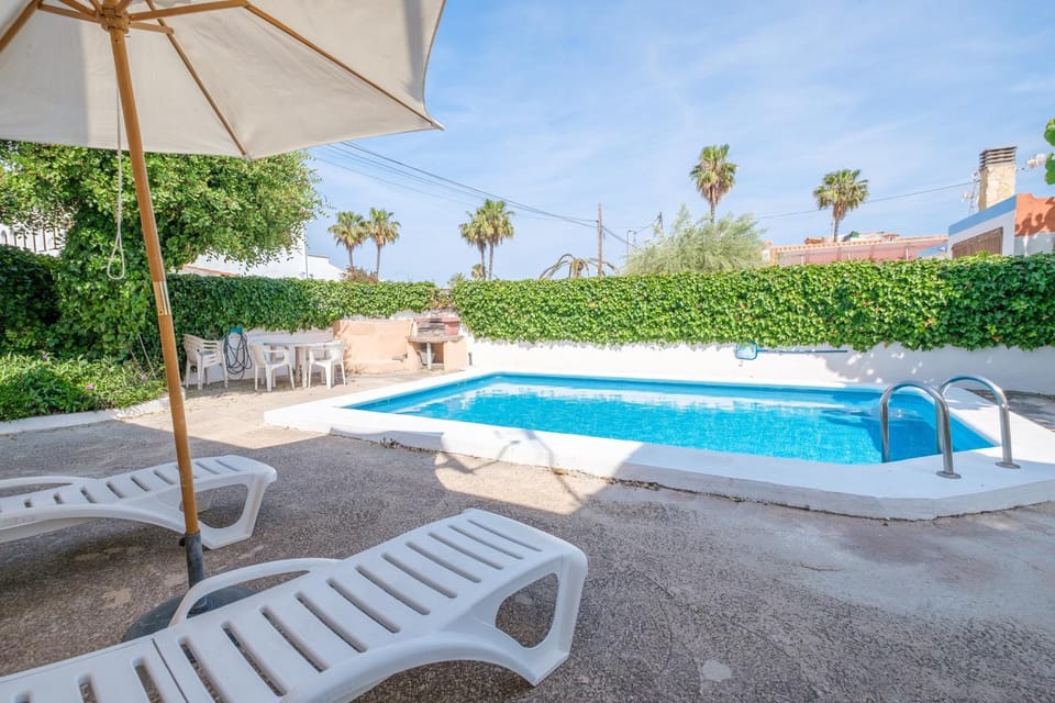 Property building, Living room, Swimming pool