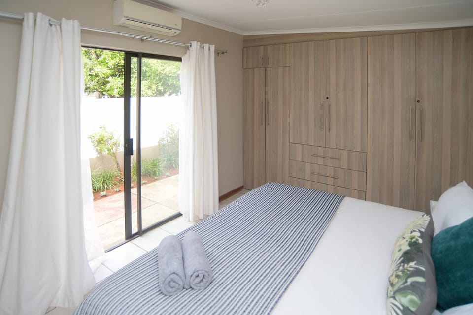 Bed, Photo of the whole room, Bedroom, towels, wardrobe, air conditioner