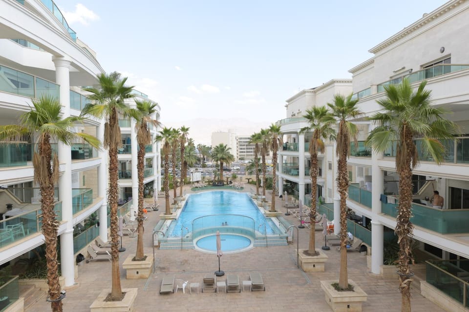 Property building, Pool view, Swimming pool, sunbed