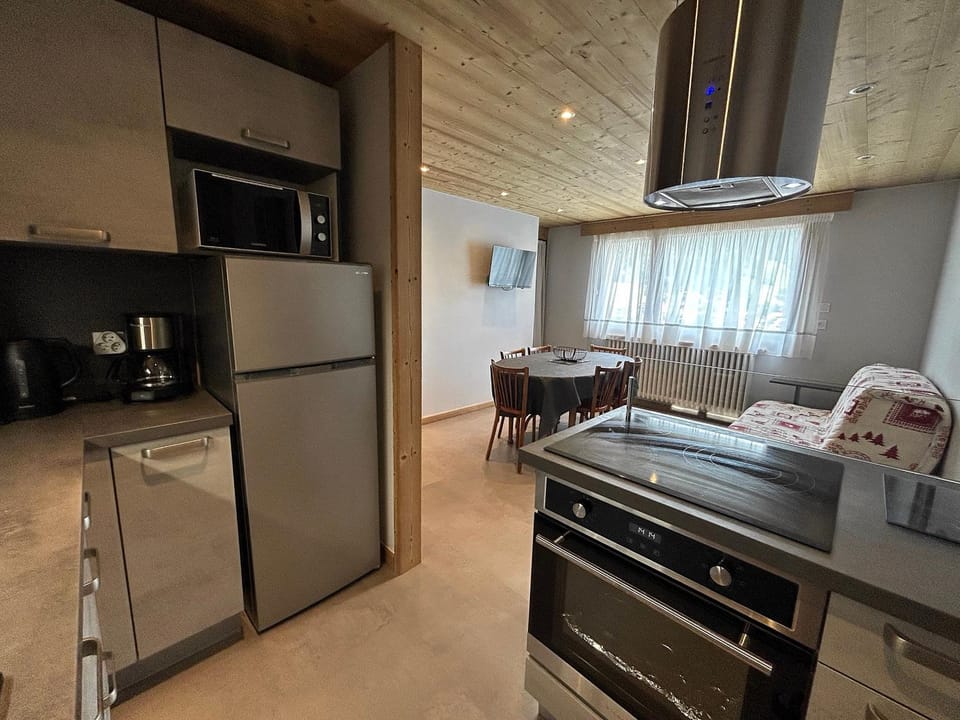 Kitchen or kitchenette, dishwasher, oven, stove, toaster