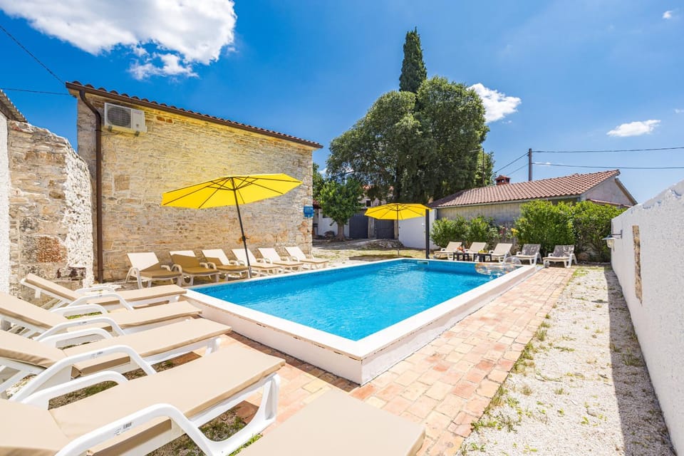 Patio, Day, Pool view, Swimming pool, sunbed