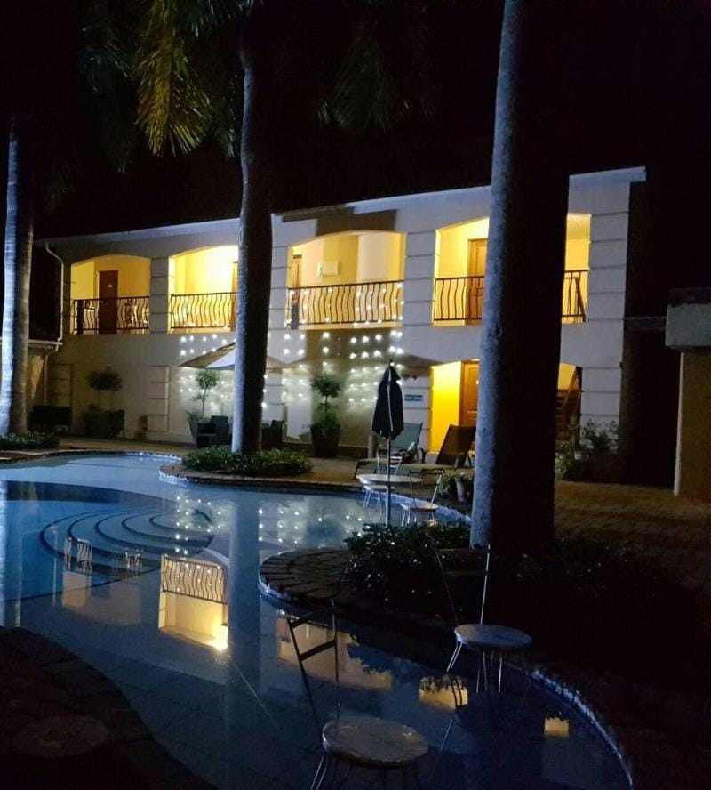 Property building, Swimming pool, Sunset
