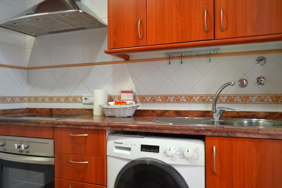 Kitchen or kitchenette, washing machine