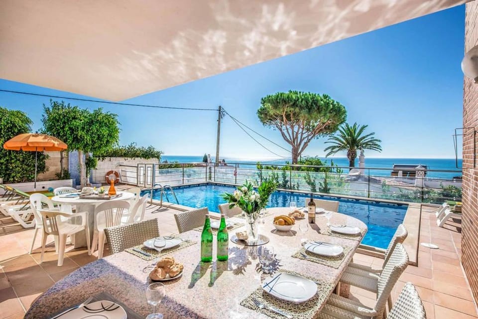 Property building, Living room, Swimming pool