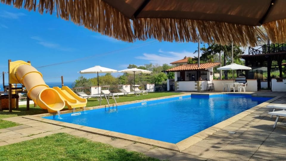 Property building, Living room, Swimming pool