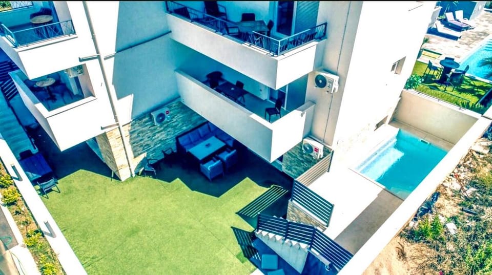 Property building, Patio, Swimming pool