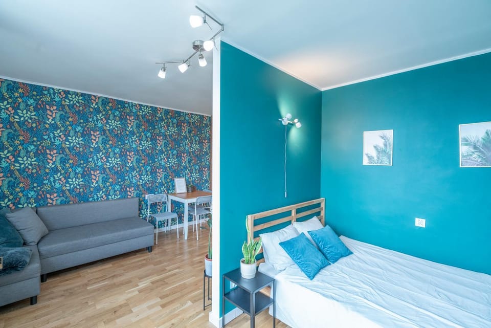 Bed, Living room, Seating area, Bedroom