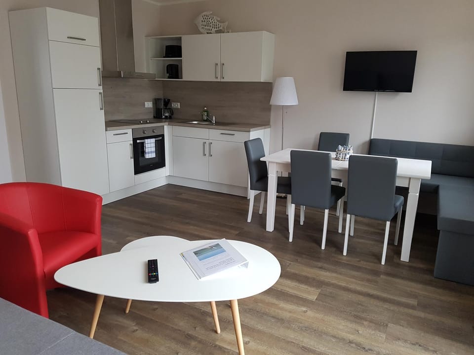 Kitchen or kitchenette, Living room, Seating area, Dining area