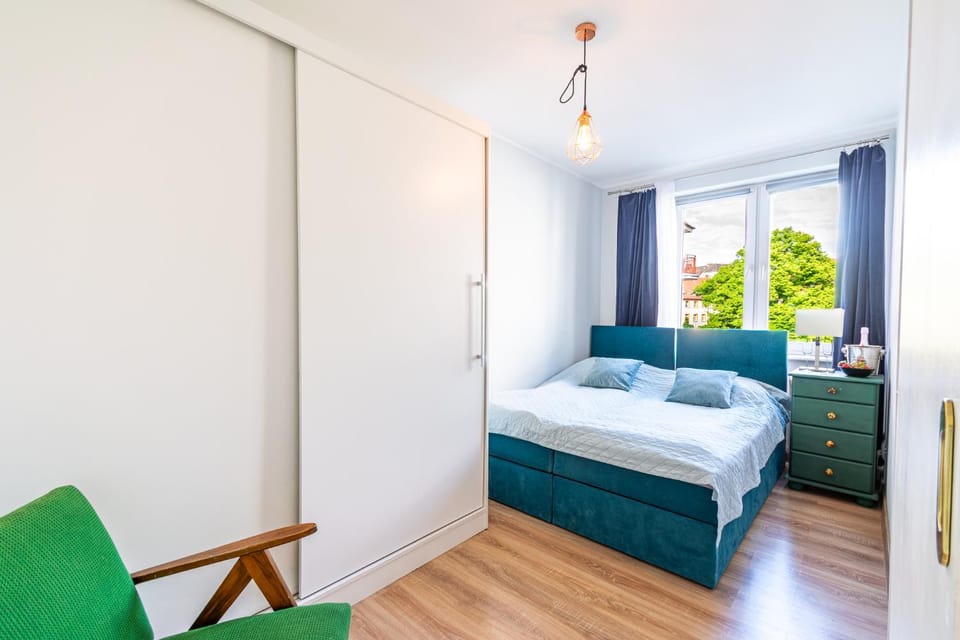 Bed, flat iron, wardrobe