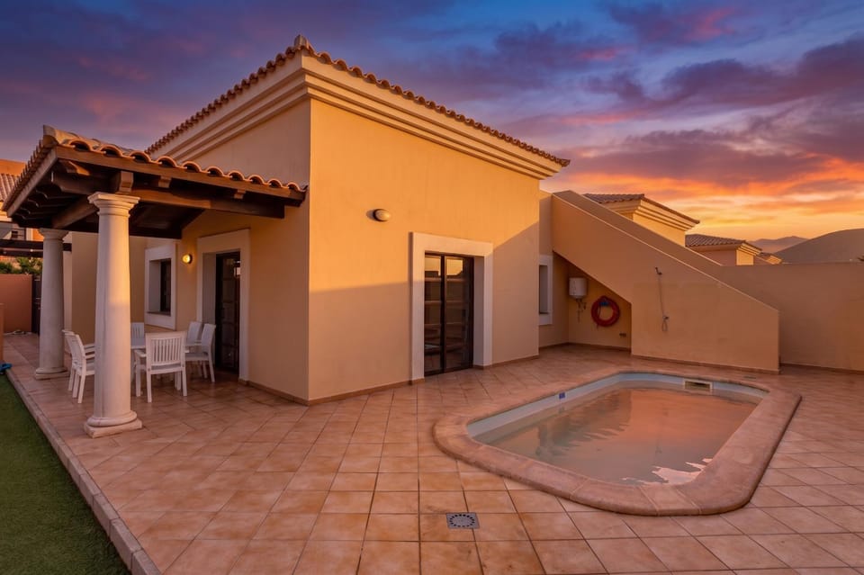 Property building, Facade/entrance, Off site, Day, Pool view, Swimming pool