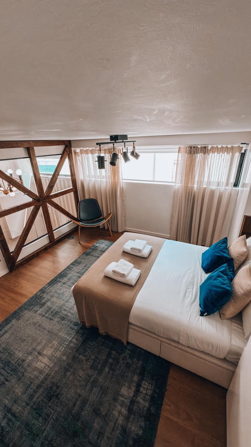 Bed, Photo of the whole room, Decorative detail, Bedroom, towels, wardrobe, air conditioner