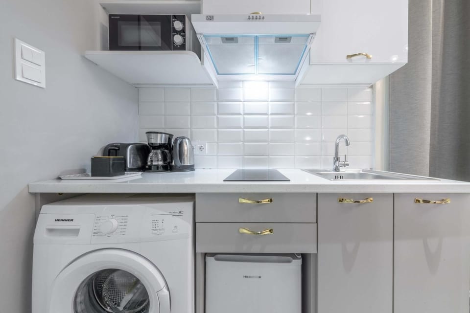 Coffee/tea facilities, Kitchen or kitchenette, minibar, stove, toaster, washing machine