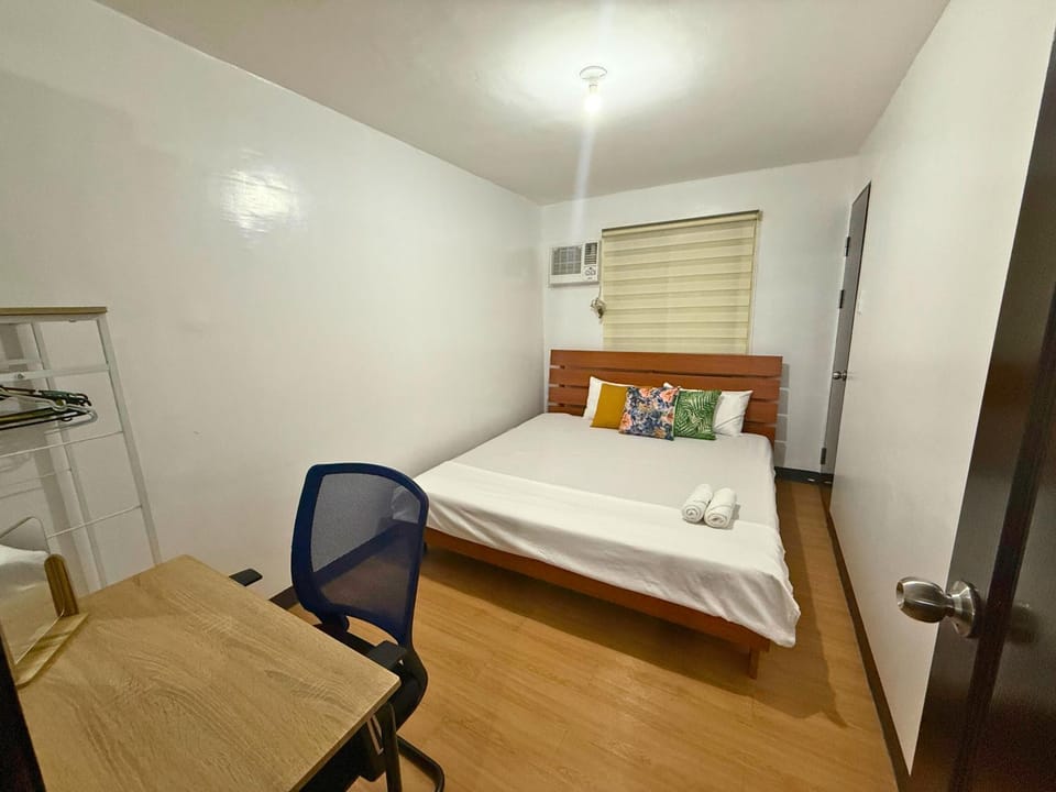 2-Bedroom Condo in Imus Cavite with UNLI WIFI, 50" TV, Netflix, Family Computer, Pool Apartment in Bacoor