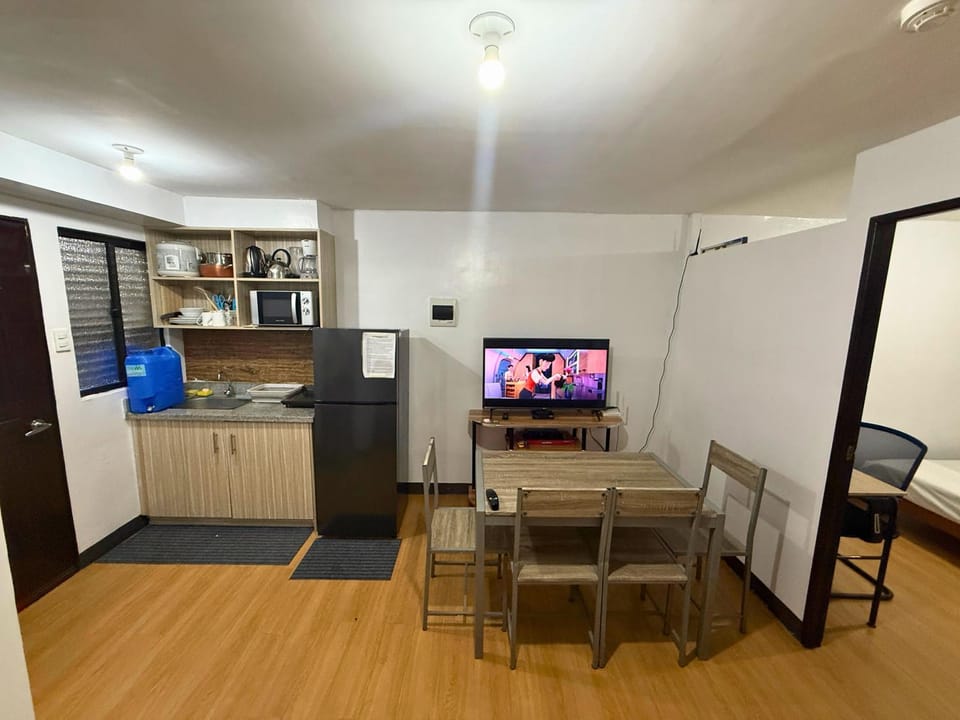 2-Bedroom Condo in Imus Cavite with UNLI WIFI, 50" TV, Netflix, Family Computer, Pool Apartment in Bacoor