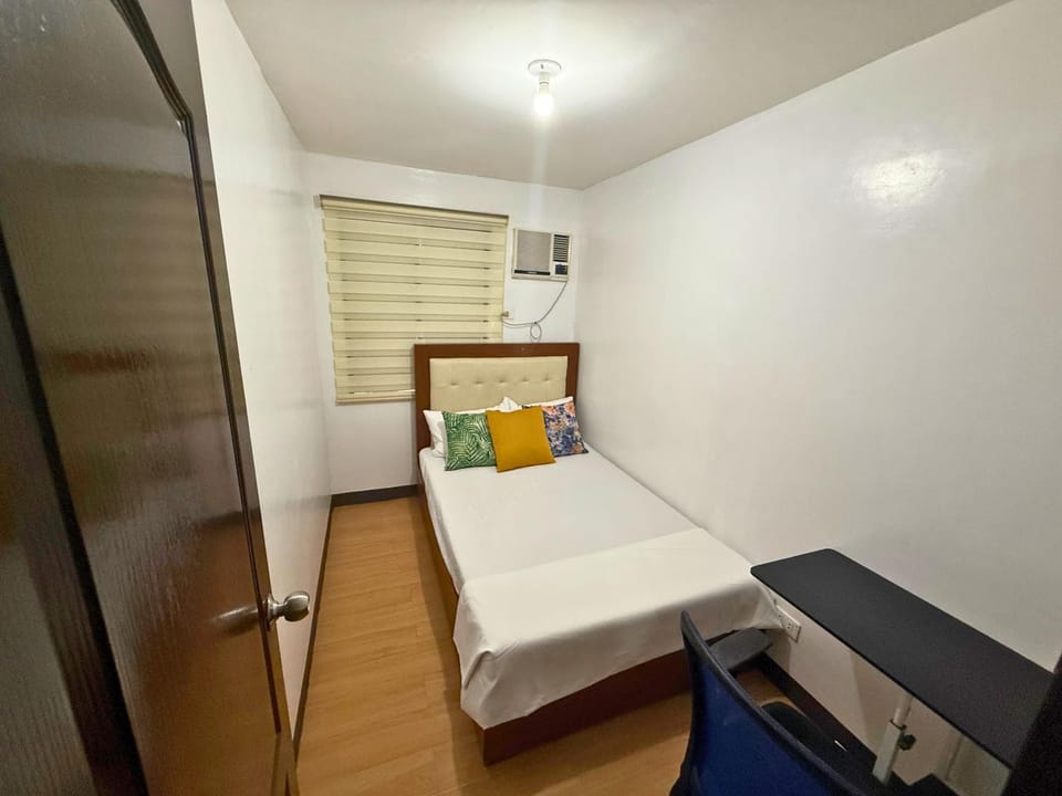 2-Bedroom Condo in Imus Cavite with UNLI WIFI, 50" TV, Netflix, Family Computer, Pool Apartment in Bacoor