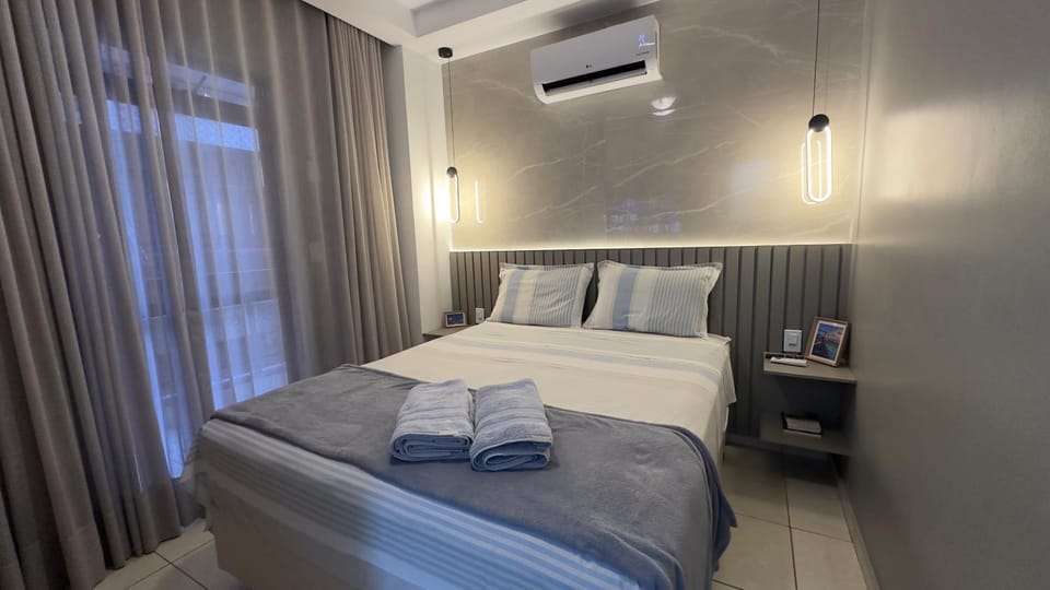 Bed, Photo of the whole room, Bedroom, towels, air conditioner
