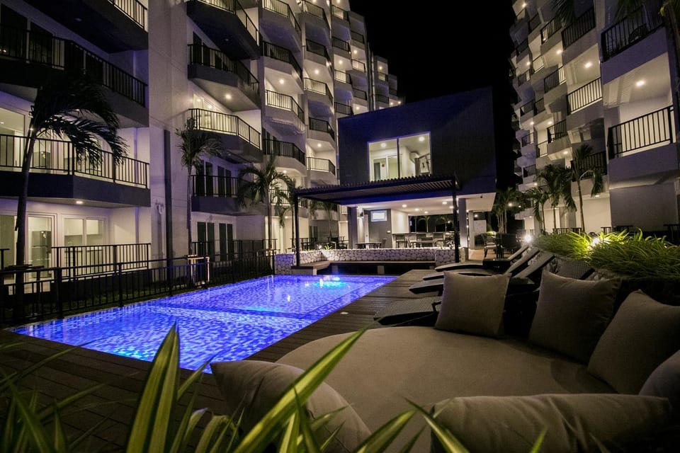 Property building, Night, Pool view, Swimming pool, Swimming pool, sunbed