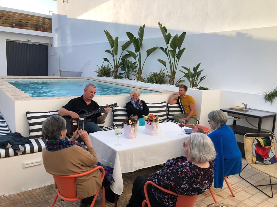 People, Seating area, Dining area, Swimming pool, group of guests